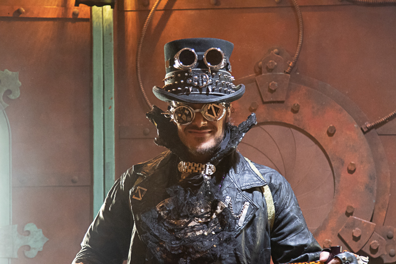 Steampunk costume detail — layered accessories and brass mechanisms